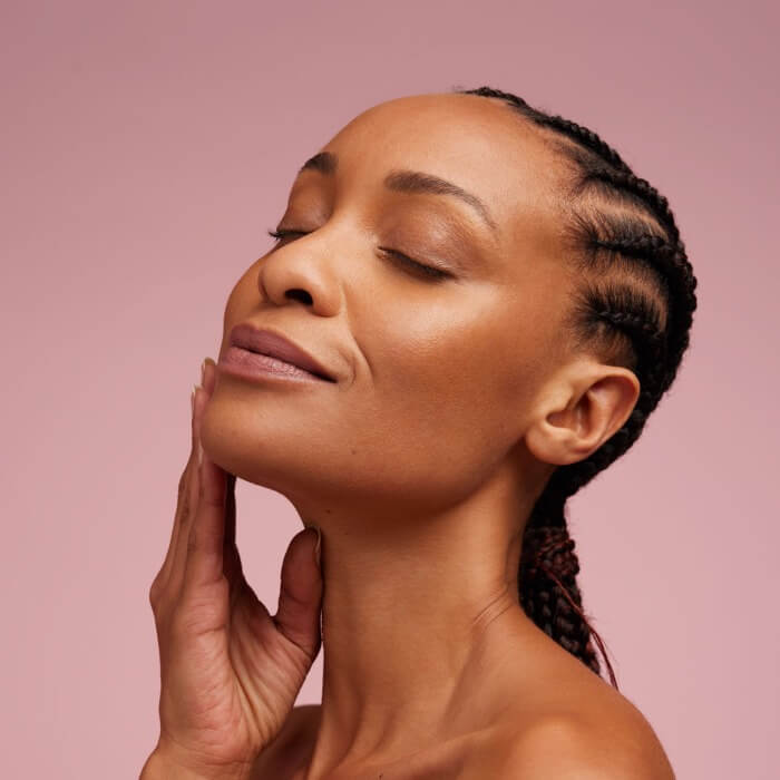 Mature black woman with no fine lines, thanks to Botox.